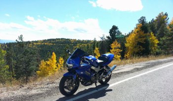 Super Seer Motorcycle Helmet and Honda SuperHawk with fall leaves 